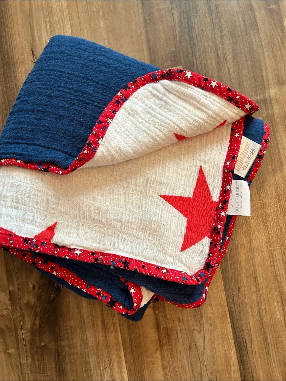 aden + anais Red Star Muslin Baby Blanket on White